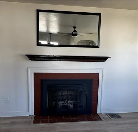 a living room with a fireplace