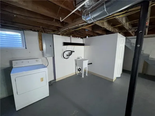a view of a storage & utility room with washer and dryer