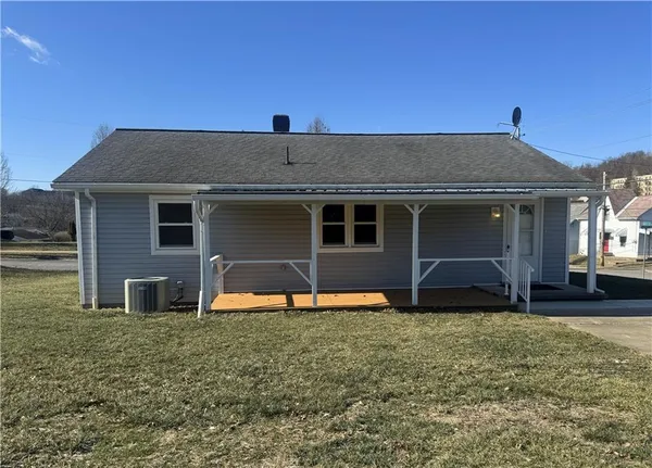 front view of a house with a yard