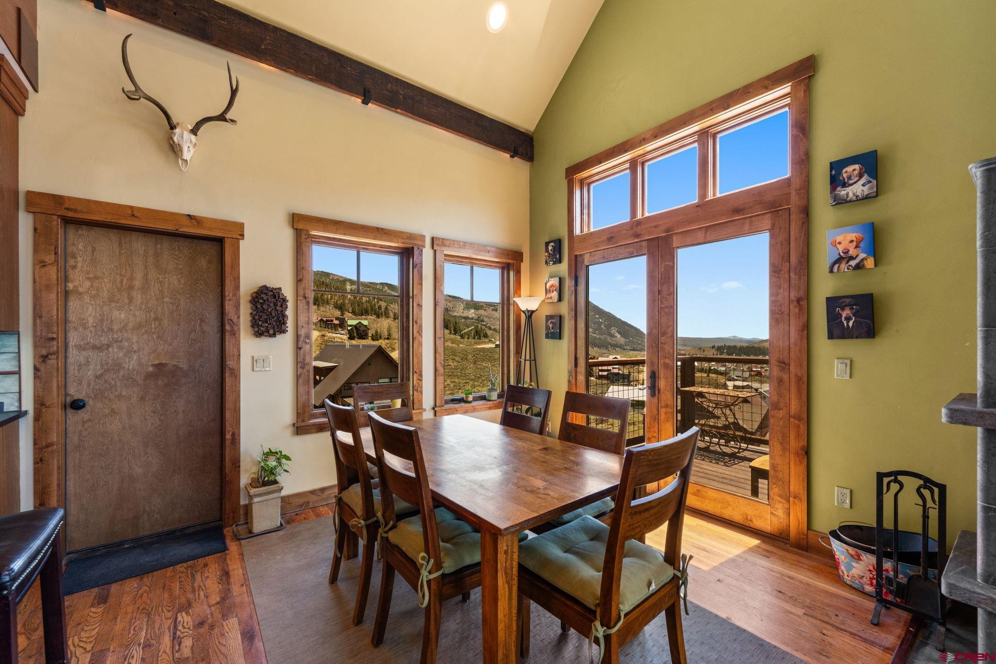 3893 Bryant Avenue Crested Butte, CO 81224 - Photo 14 of 45 a view of a dining room with furniture window and outside view