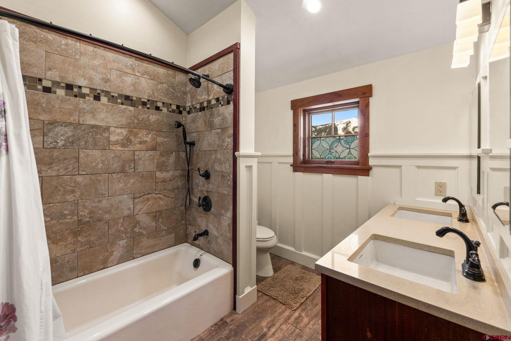 3893 Bryant Avenue Crested Butte, CO 81224 - Photo 24 of 45 a bathroom with a sink and a bathtub