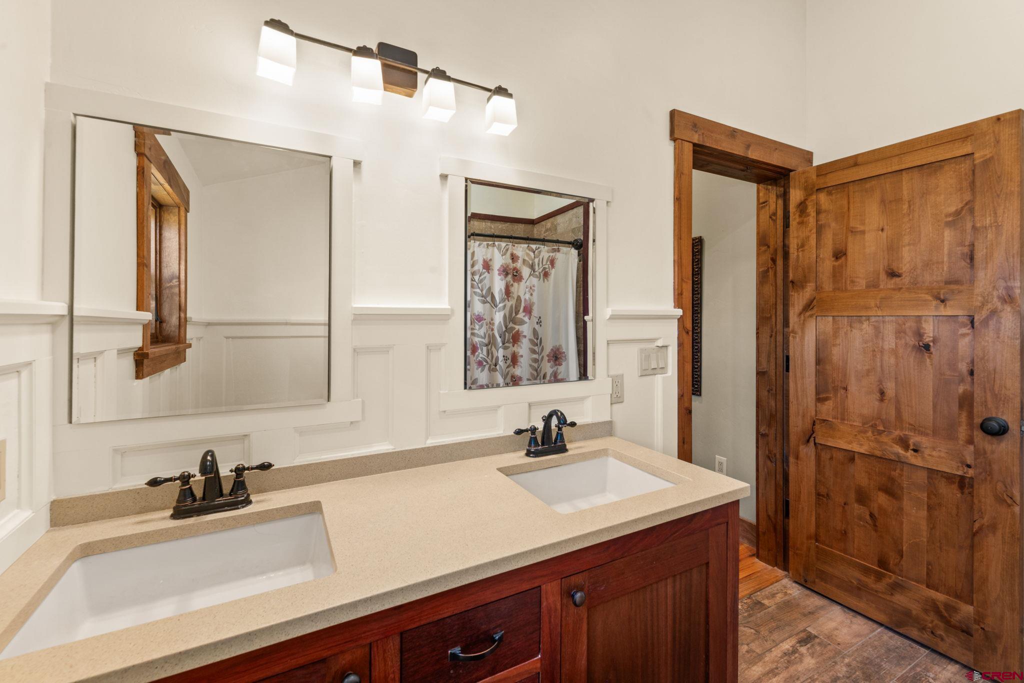 3893 Bryant Avenue Crested Butte, CO 81224 - Photo 25 of 45 a bathroom with a sink and a mirror