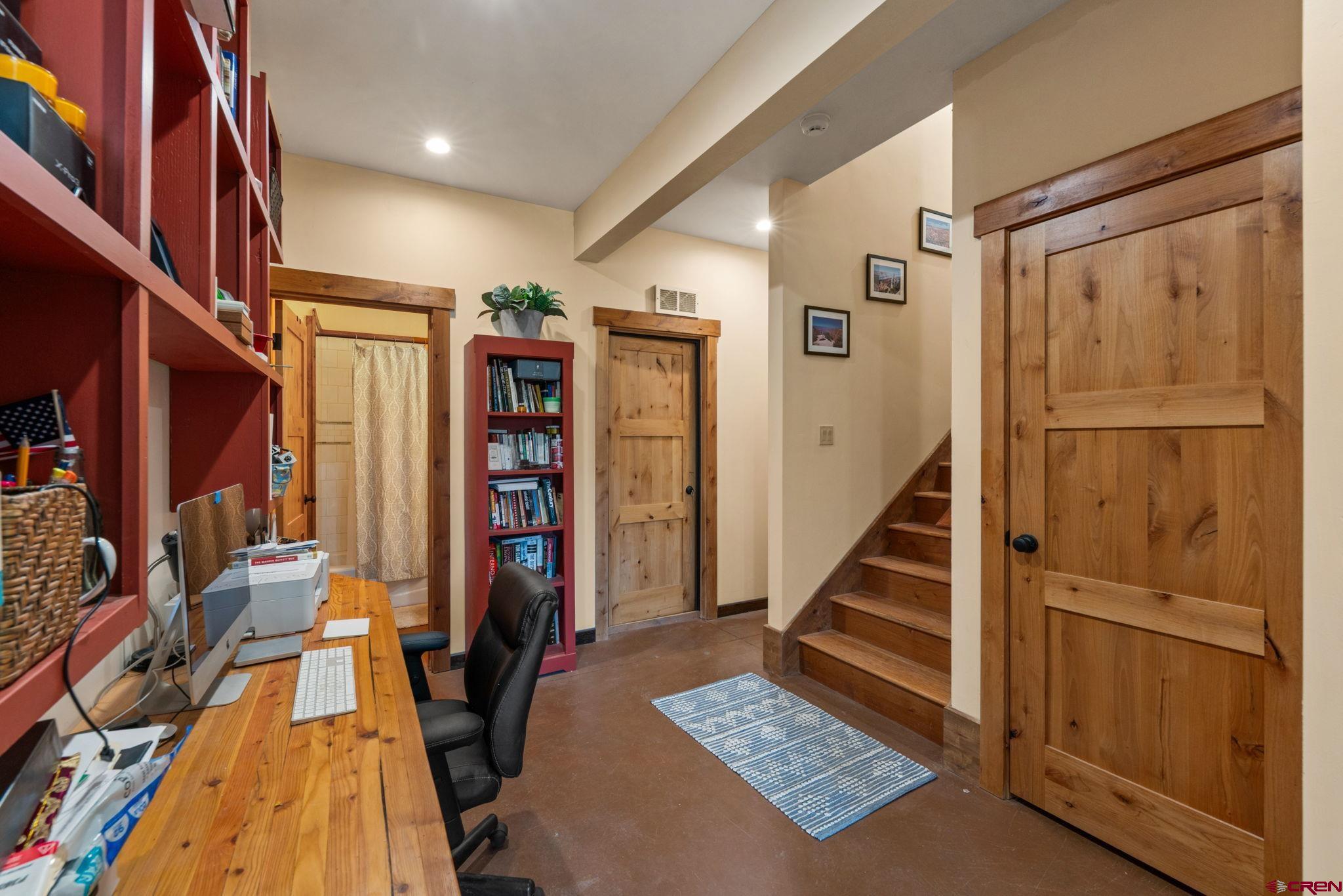 3893 Bryant Avenue Crested Butte, CO 81224 - Photo 32 of 45 a view of an entryway with wooden floor and stairs