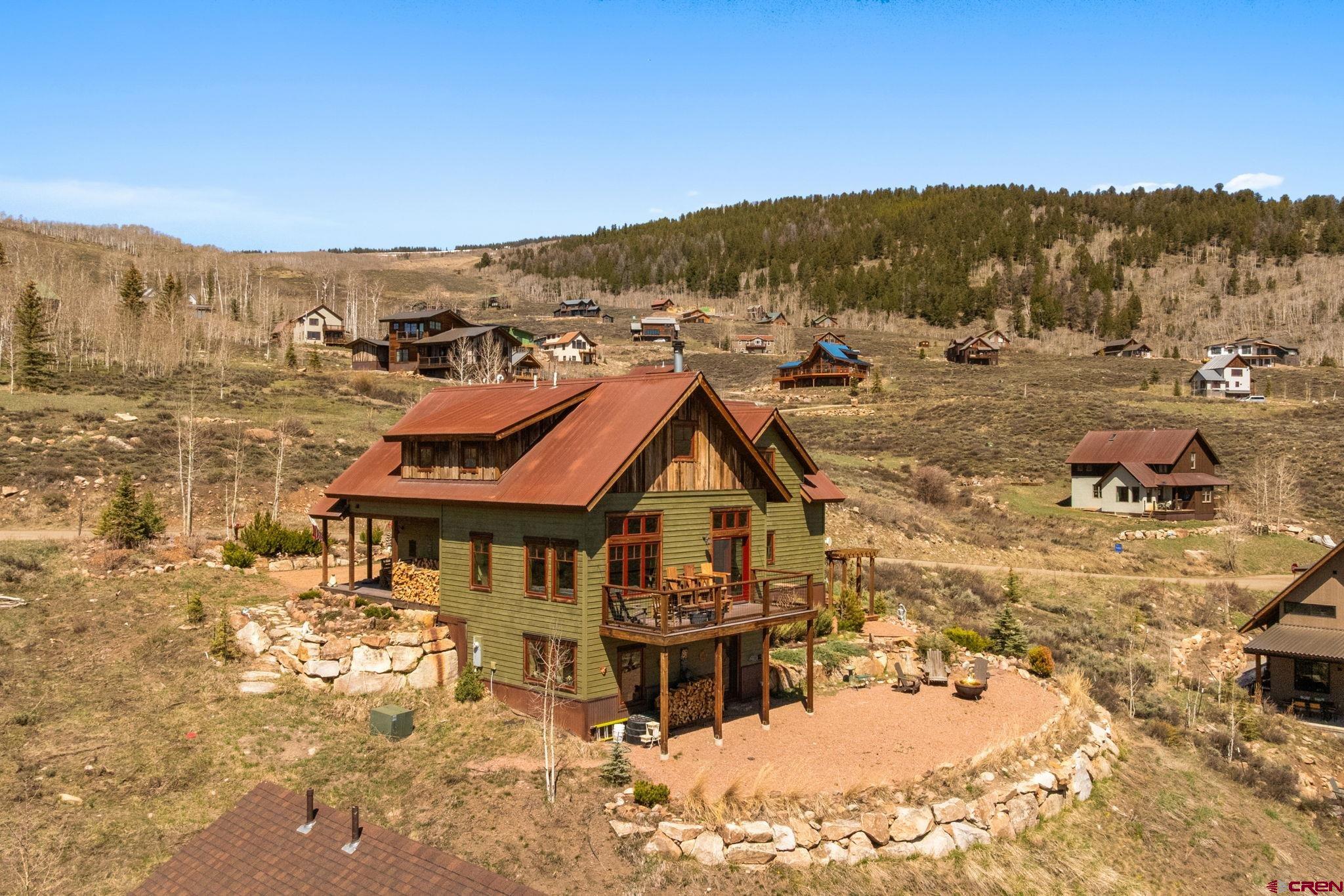 3893 Bryant Avenue Crested Butte, CO 81224 - Photo 44 of 45 a view of a town with mountains in the background
