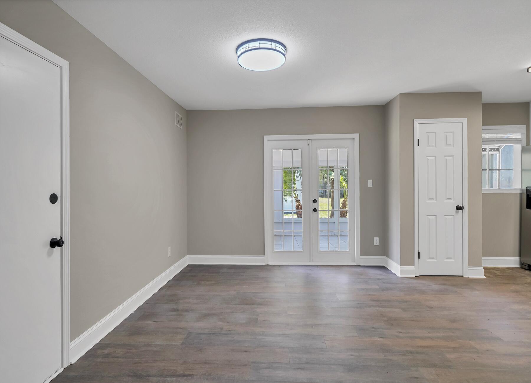 6935 Jasper Street Navarre, FL 32566 - Photo 15 of 45 a view of livingroom with wooden floor