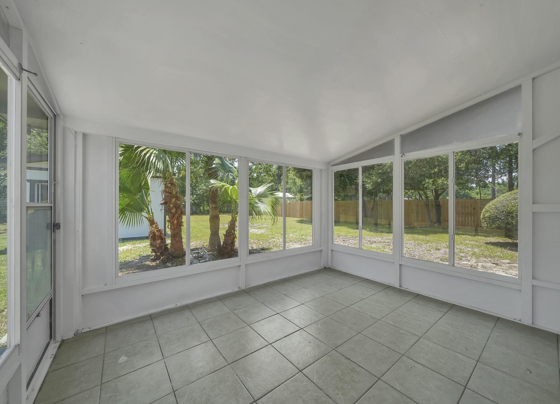 6935 Jasper Street Navarre, FL 32566 - Photo 33 of 45 a view of room with window