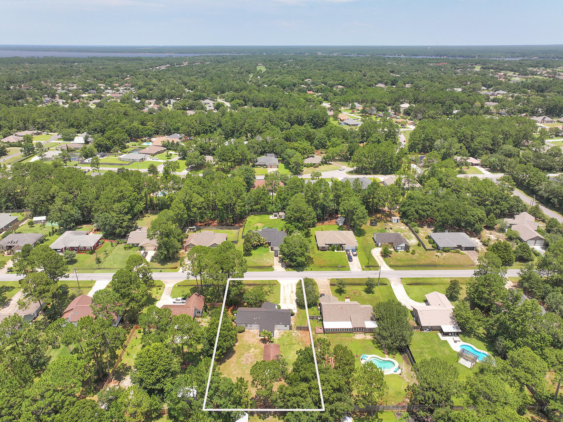 6935 Jasper Street Navarre, FL 32566 - Photo 43 of 45 a view of city with ocean