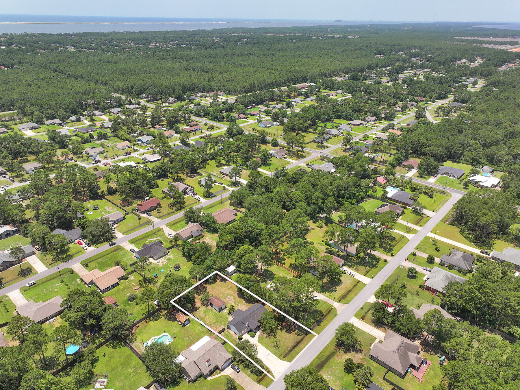 6935 Jasper Street Navarre, FL 32566 - Photo 45 of 45 a view of a city with an ocean