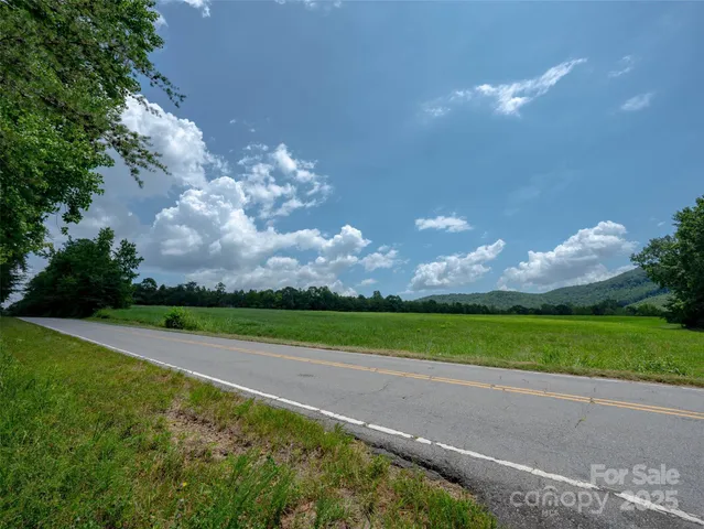 a view of a golf course with a big yard