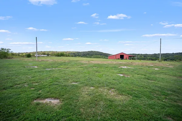 a view of outdoor space and yard