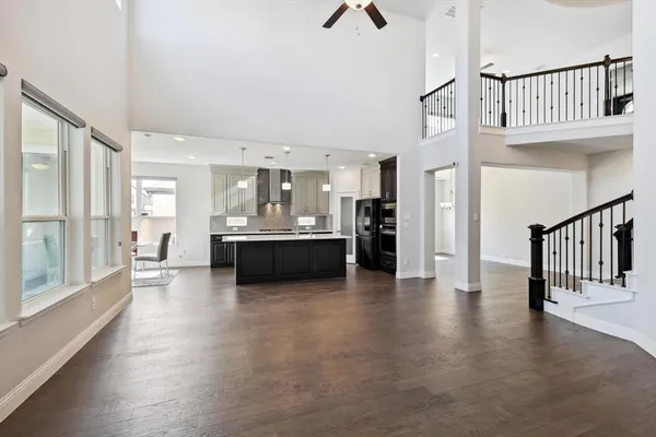 a view of a kitchen with a sink and a window