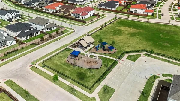 a room with lots of different kinds of flowers