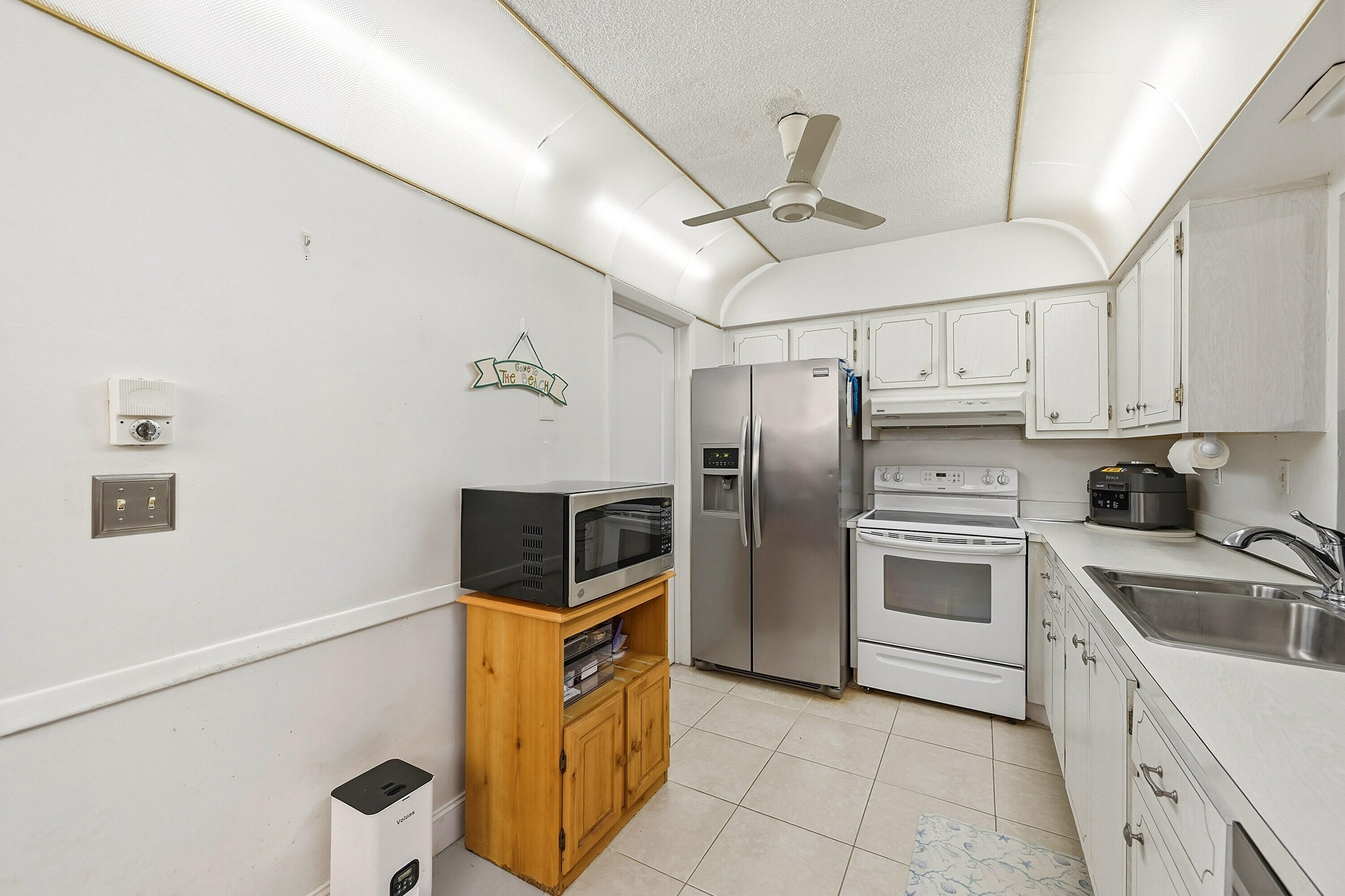 9505 Northwest 73rd Street Tamarac, FL 33321 - Photo 7 of 48 13_stl_7699