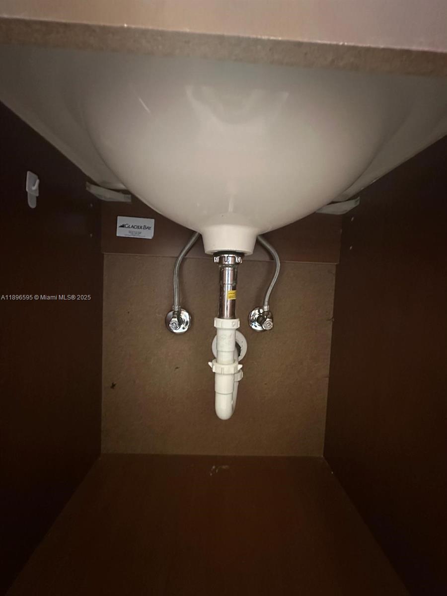 9848 Marina Boulevard, Unit 811 Boca Raton, FL 33428 - Photo 50 of 87 under the sink of the 2nd bathroom