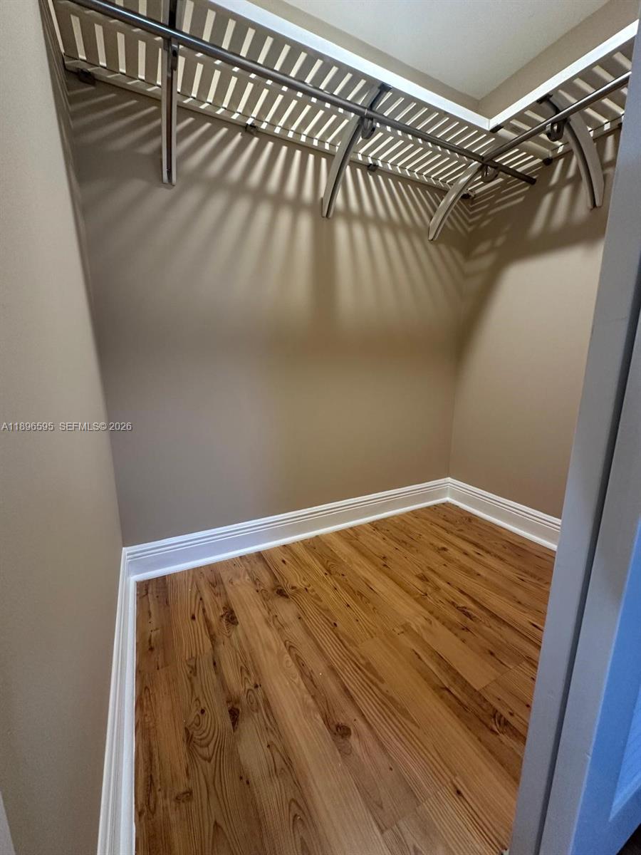 9848 Marina Boulevard, Unit 811 Boca Raton, FL 33428 - Photo 59 of 86 Master bedroom walk in closet