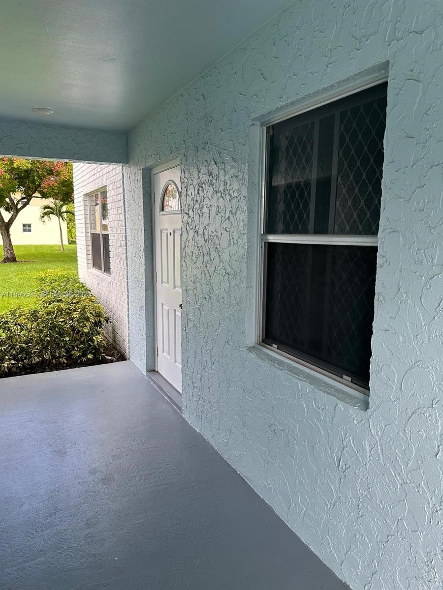 9848 Marina Boulevard, Unit 811 Boca Raton, FL 33428 - Photo 68 of 86 Infront the apartment