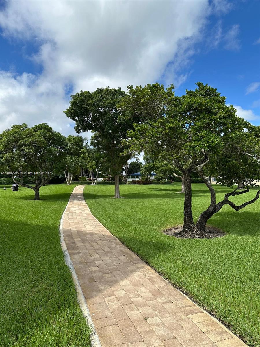 9848 Marina Boulevard, Unit 811 Boca Raton, FL 33428 - Photo 82 of 87 a view of a park with large trees
