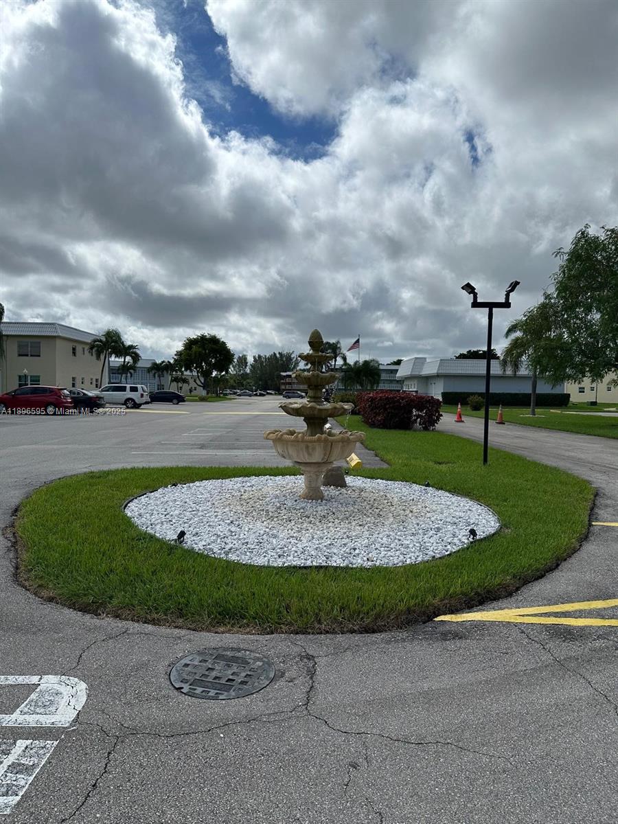 9848 Marina Boulevard, Unit 811 Boca Raton, FL 33428 - Photo 87 of 87 a view of a playground with plants