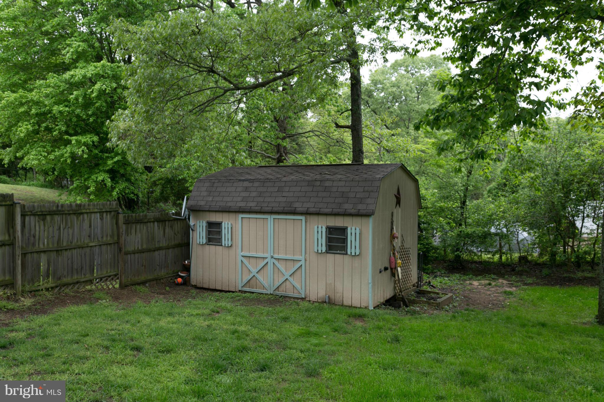 1174 Calvert Beach Road St. Leonard, MD 20685 - Photo 21 of 27 Exterior (Rear)