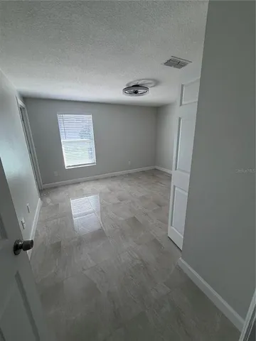 a bathroom with a sink toilet and mirror
