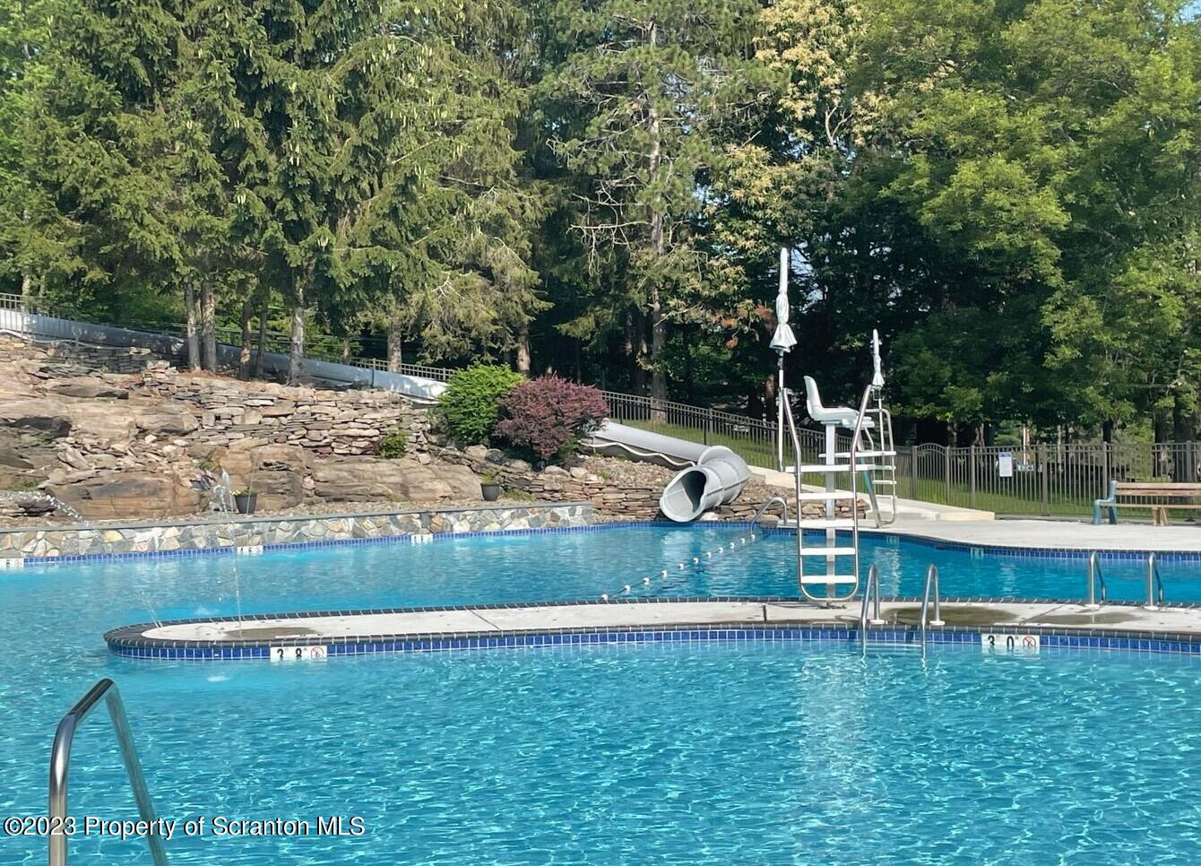 1144 Commanche Circle Lake Ariel, PA 18436 - Photo 22 of 28 a view of a backyard with swimming pool