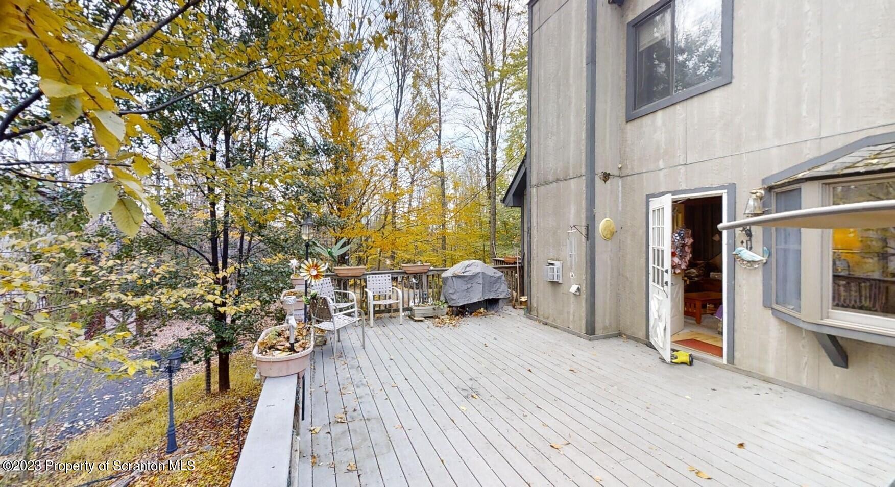 1144 Commanche Circle Lake Ariel, PA 18436 - Photo 10 of 28 a view of steet with deck