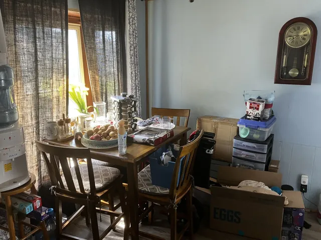 a view of a dining room with furniture window and outside view