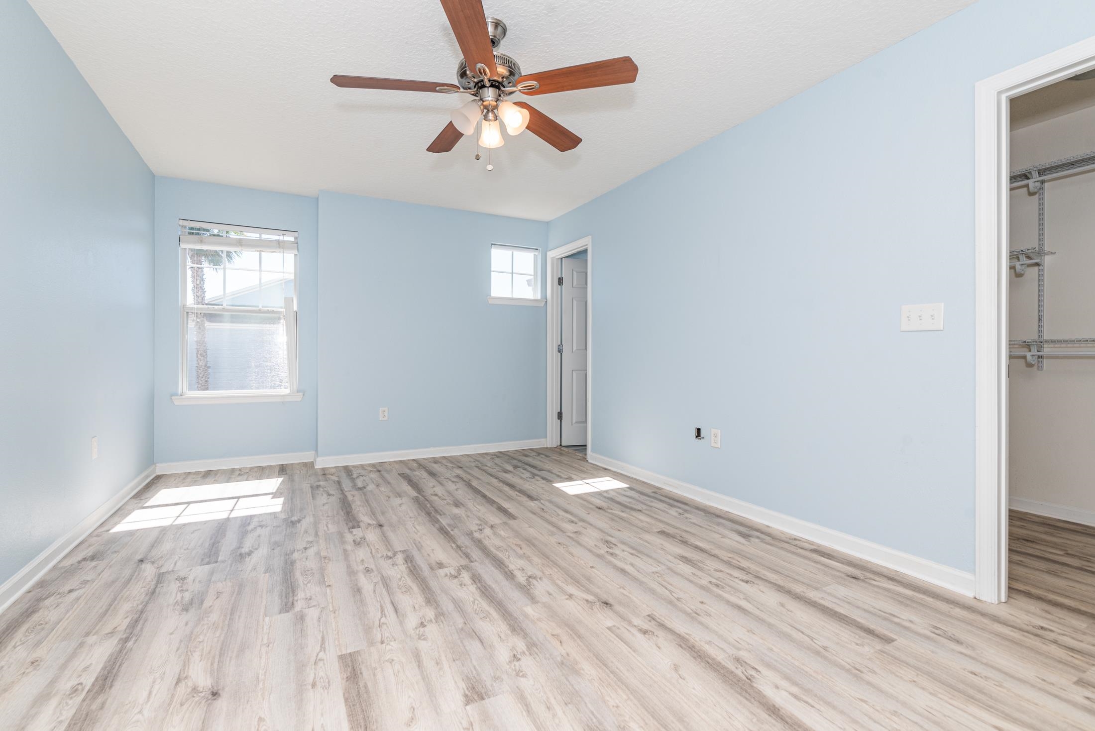 128 A Islander Circle St. Augustine, FL 32080 - Photo 14 of 26 wooden floor in an empty room with a window