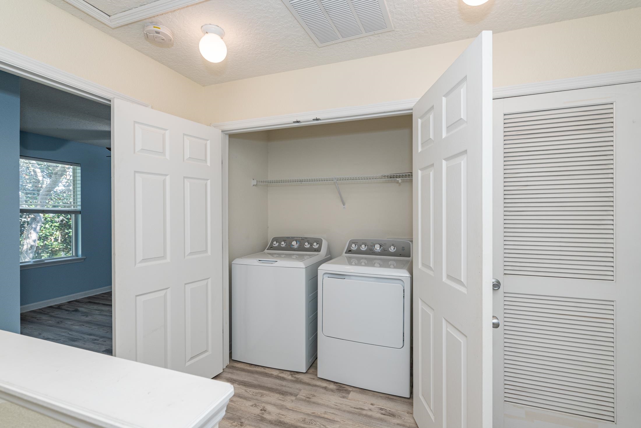 128 A Islander Circle St. Augustine, FL 32080 - Photo 17 of 26 a utility room with dryer and washer
