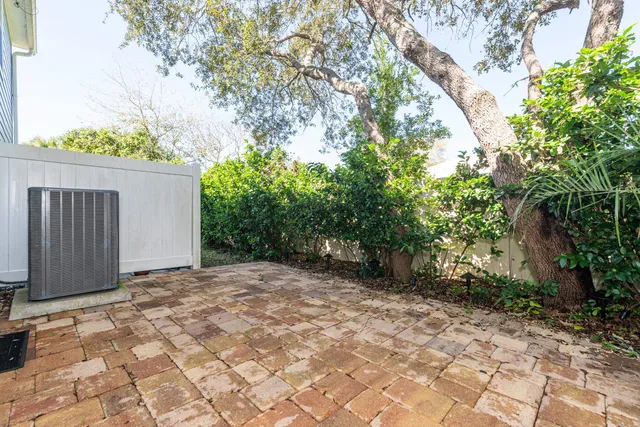 a view of a house with pool porch and wooden floor