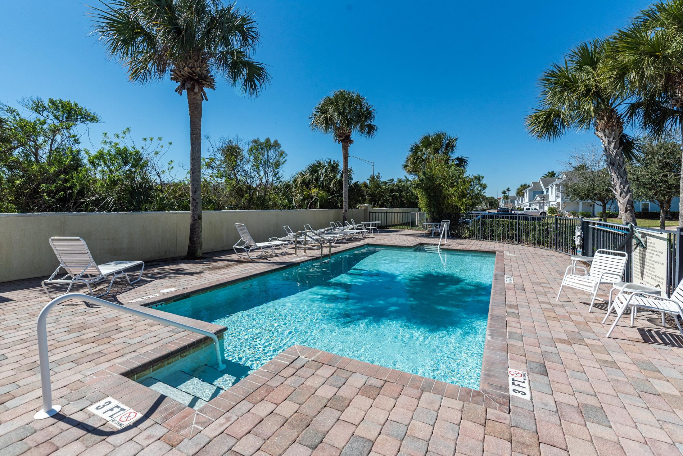 128 A Islander Circle St. Augustine, FL 32080 - Photo 25 of 26 a view of a backyard with a patio
