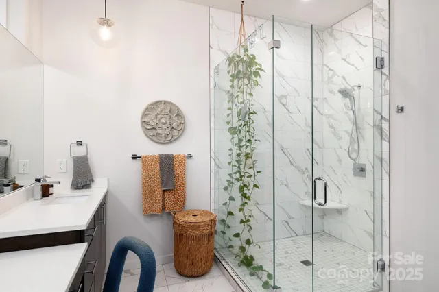 a bathroom with a shower curtain and a sink