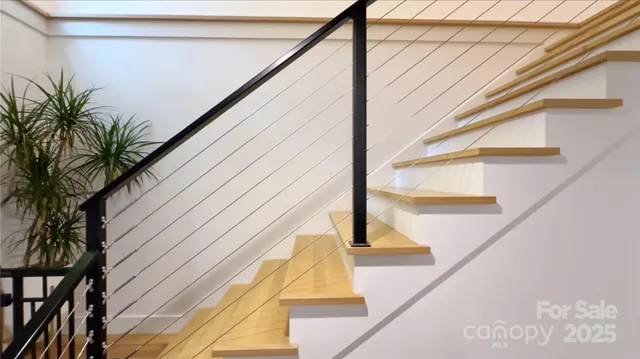 a view of balcony with wooden floor and door