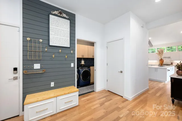 a view of an empty room and a window