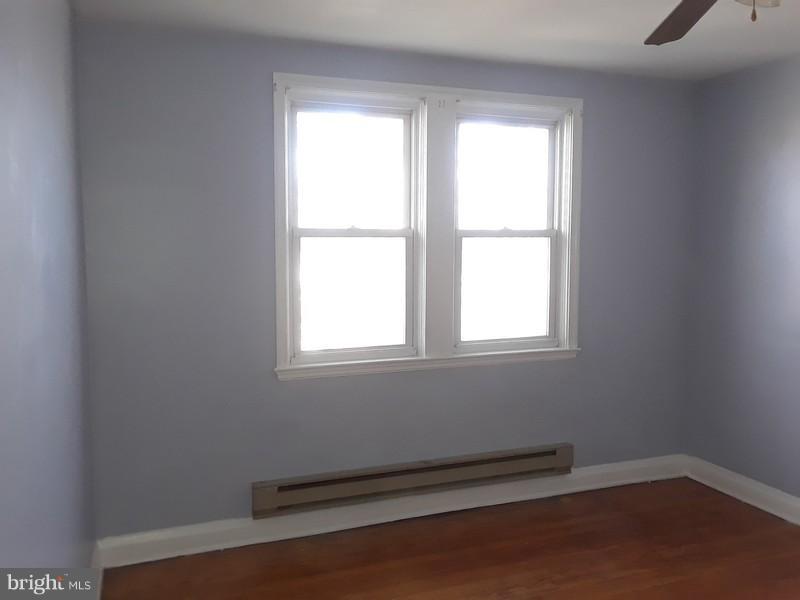 726 Braeside Road Baltimore, MD 21229 - Photo 12 of 15 an empty room with a window