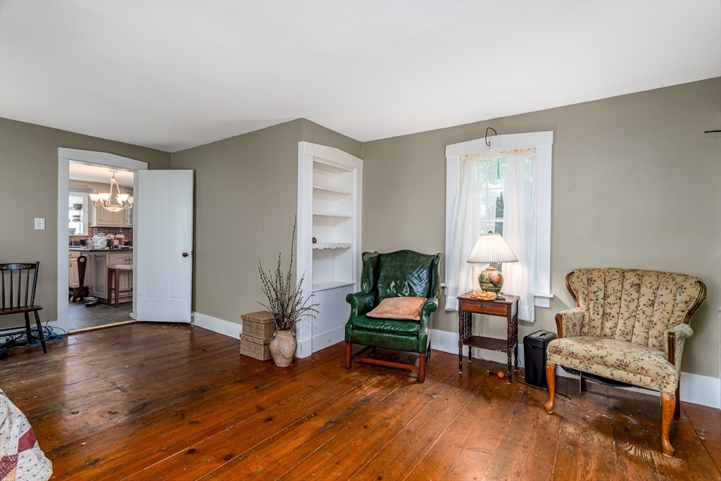 16 Maple Street Sterling, MA 01564 - Photo 25 of 42 a living room with furniture and wooden floor