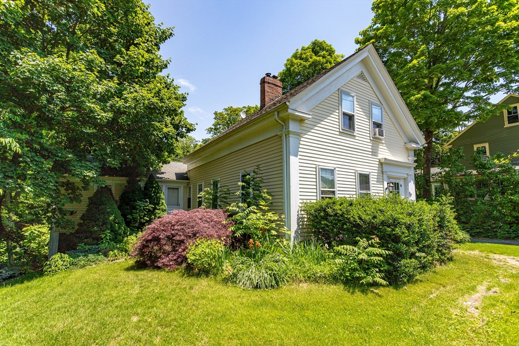 16 Maple Street Sterling, MA 01564 - Photo 3 of 42 front view of a house with a yard