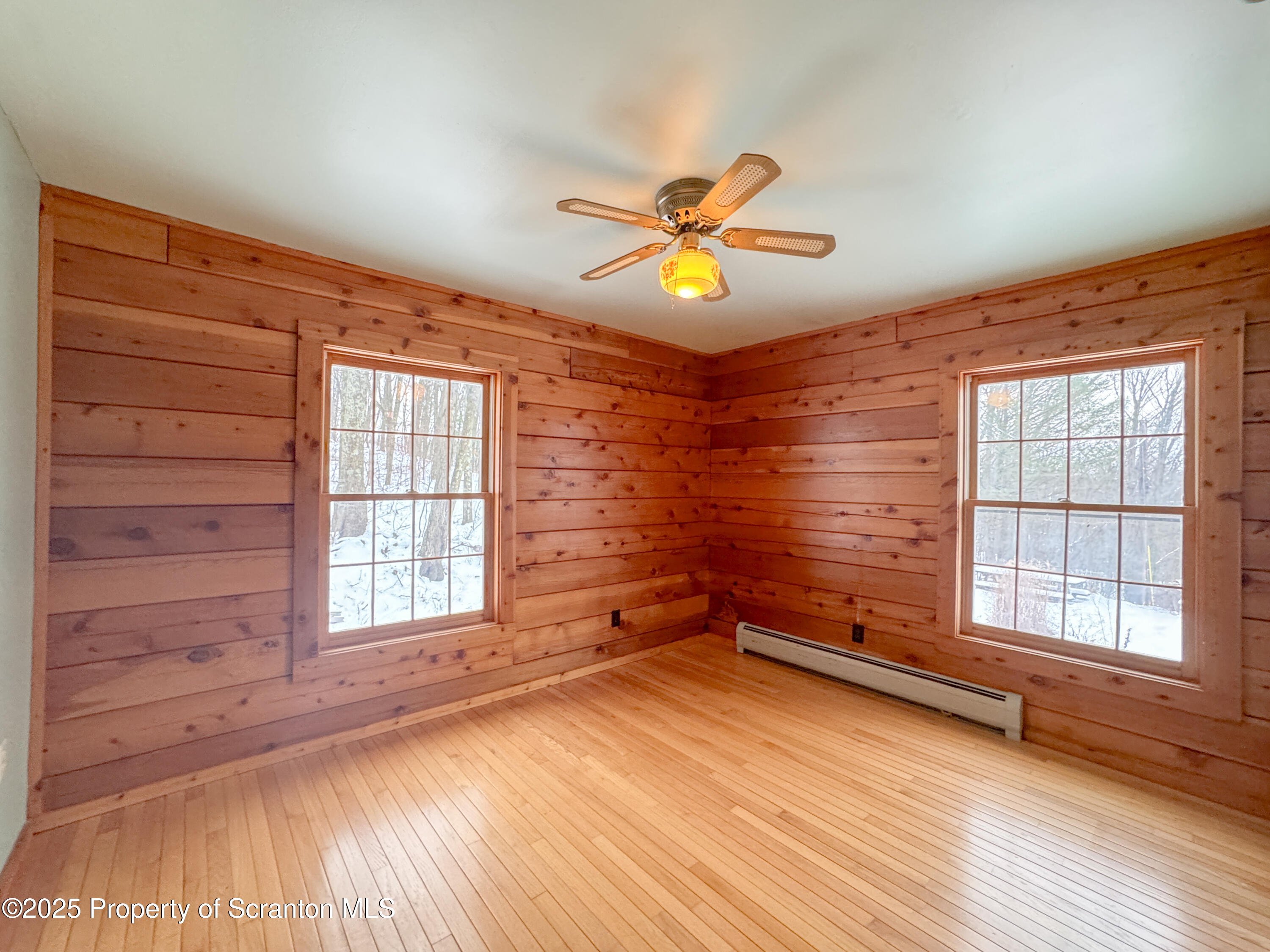 2607 Ransom Road Clarks Summit, PA 18411 - Photo 14 of 46 wooden floor in an empty room with a window