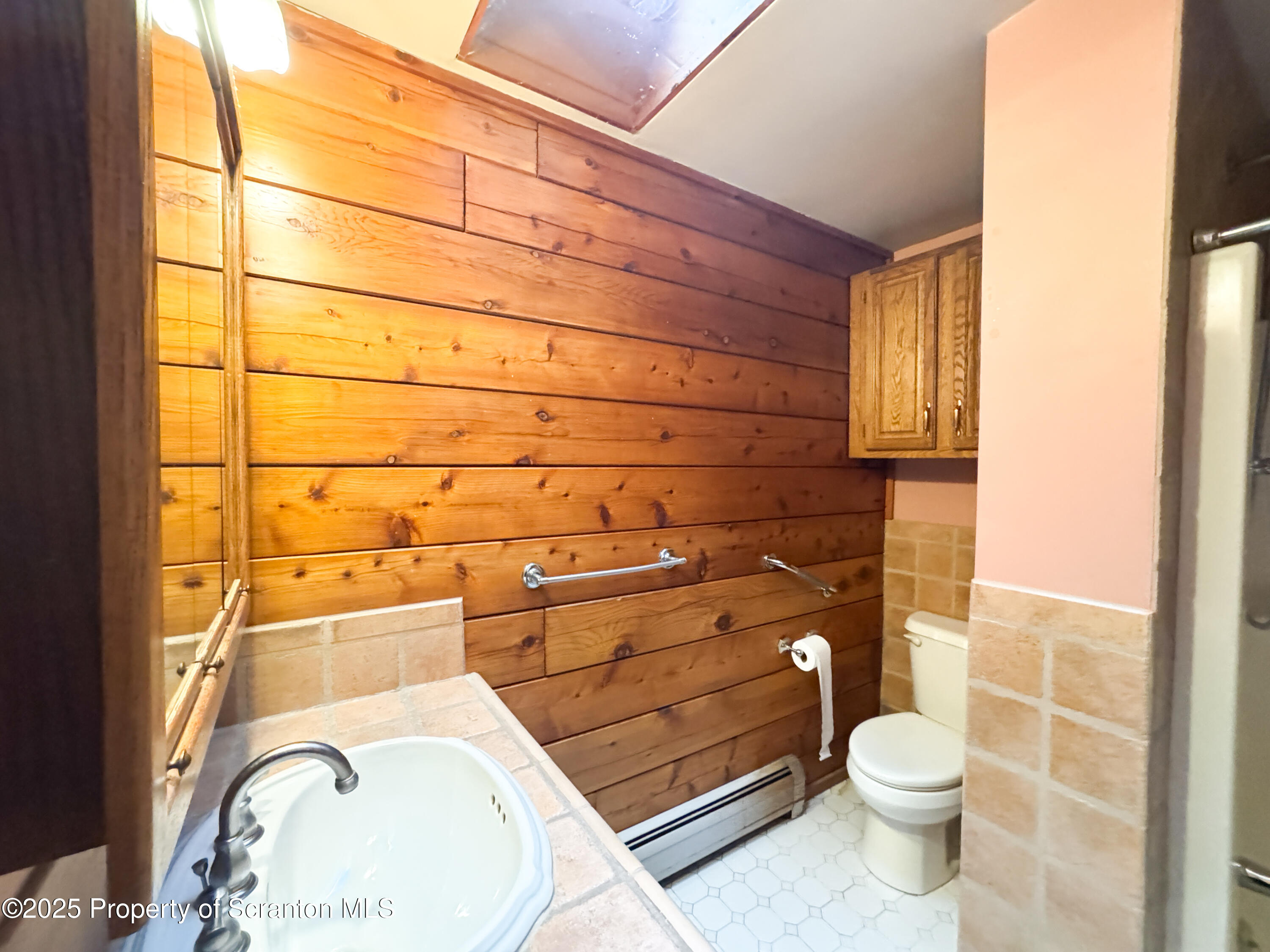 2607 Ransom Road Clarks Summit, PA 18411 - Photo 15 of 46 a bathroom with a toilet and a sink