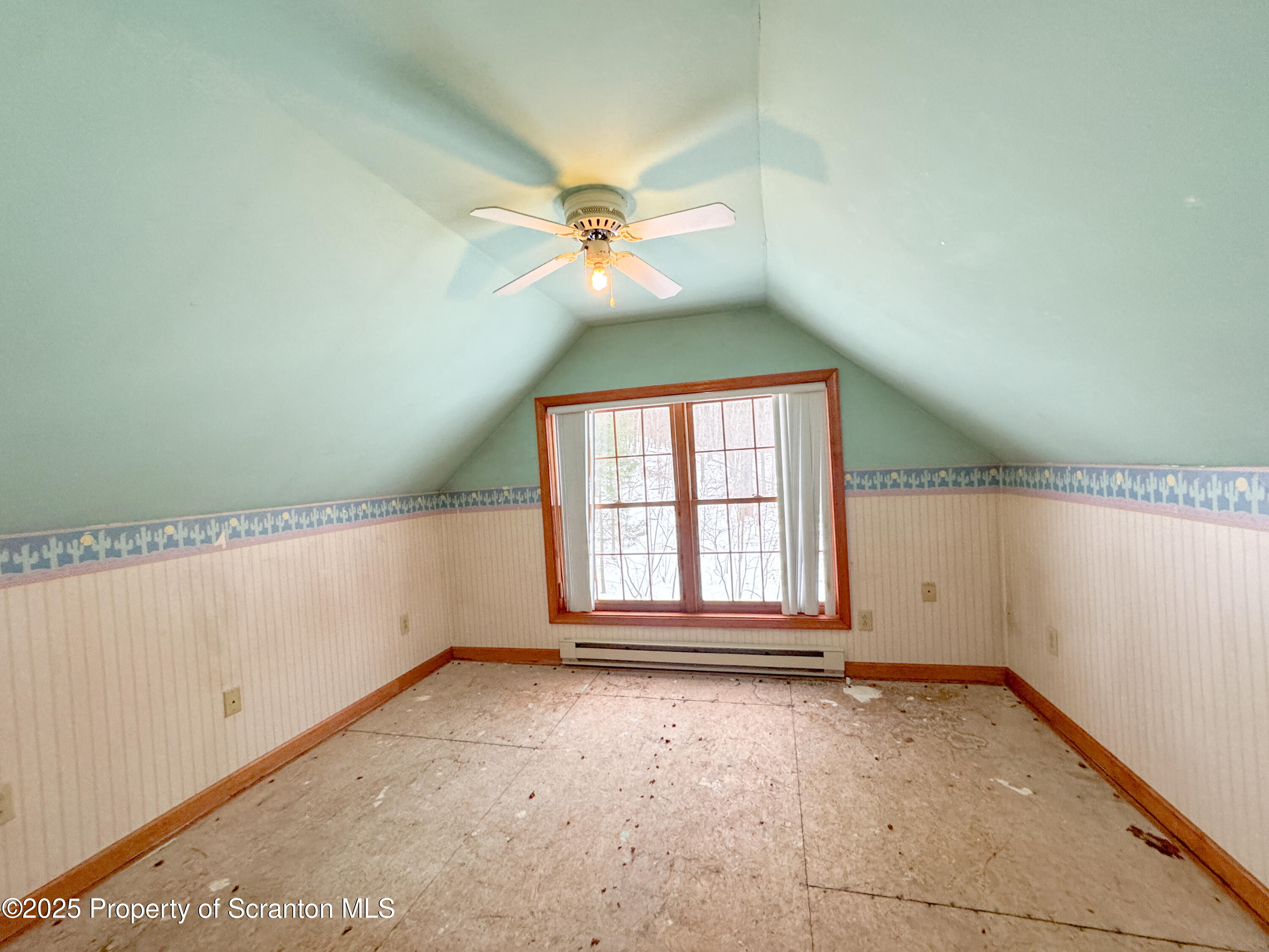 2607 Ransom Road Clarks Summit, PA 18411 - Photo 21 of 46 an empty room with chandelier fan and windows