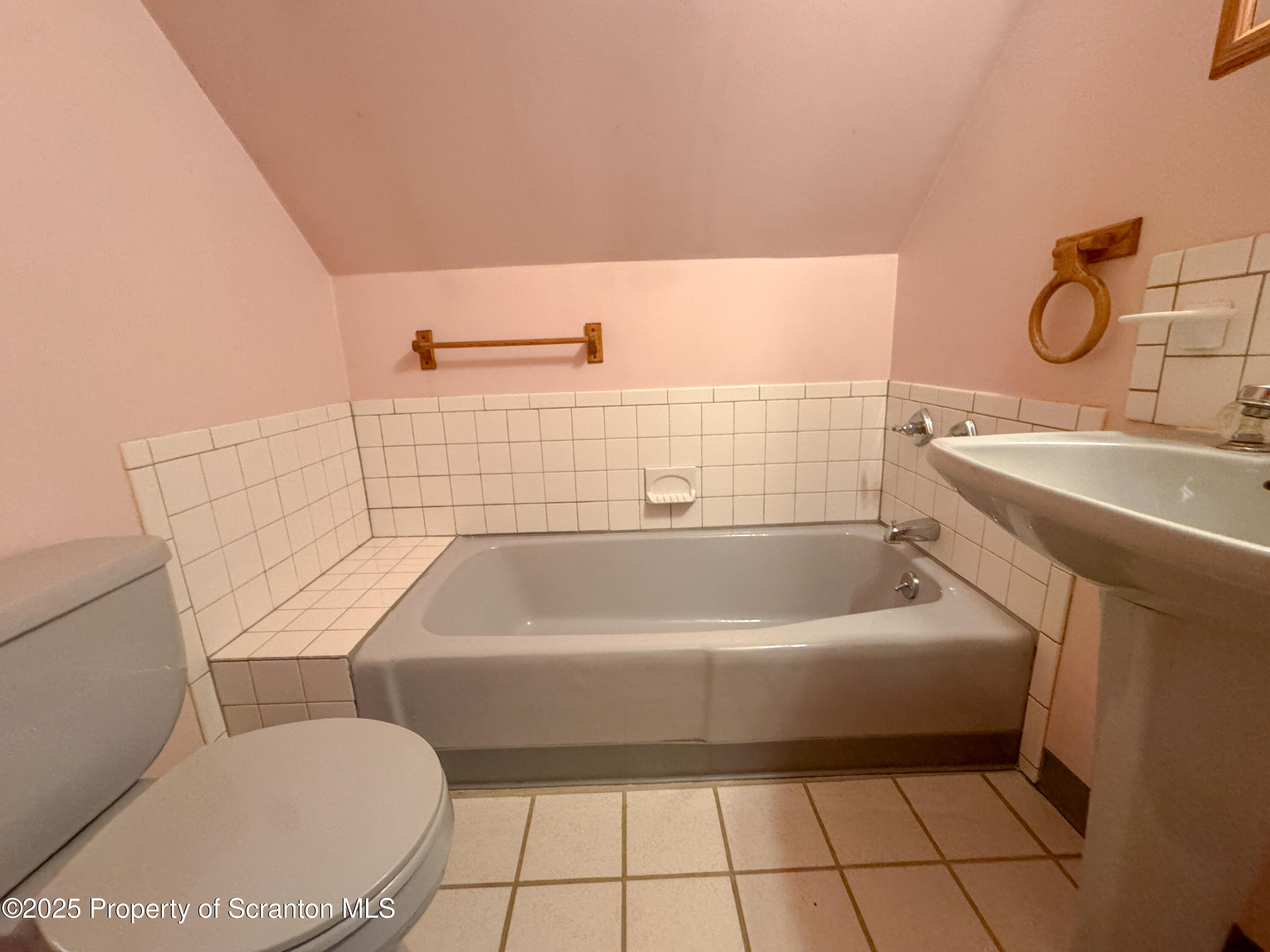 2607 Ransom Road Clarks Summit, PA 18411 - Photo 23 of 46 a bathroom with a sink a toilet and bathtub