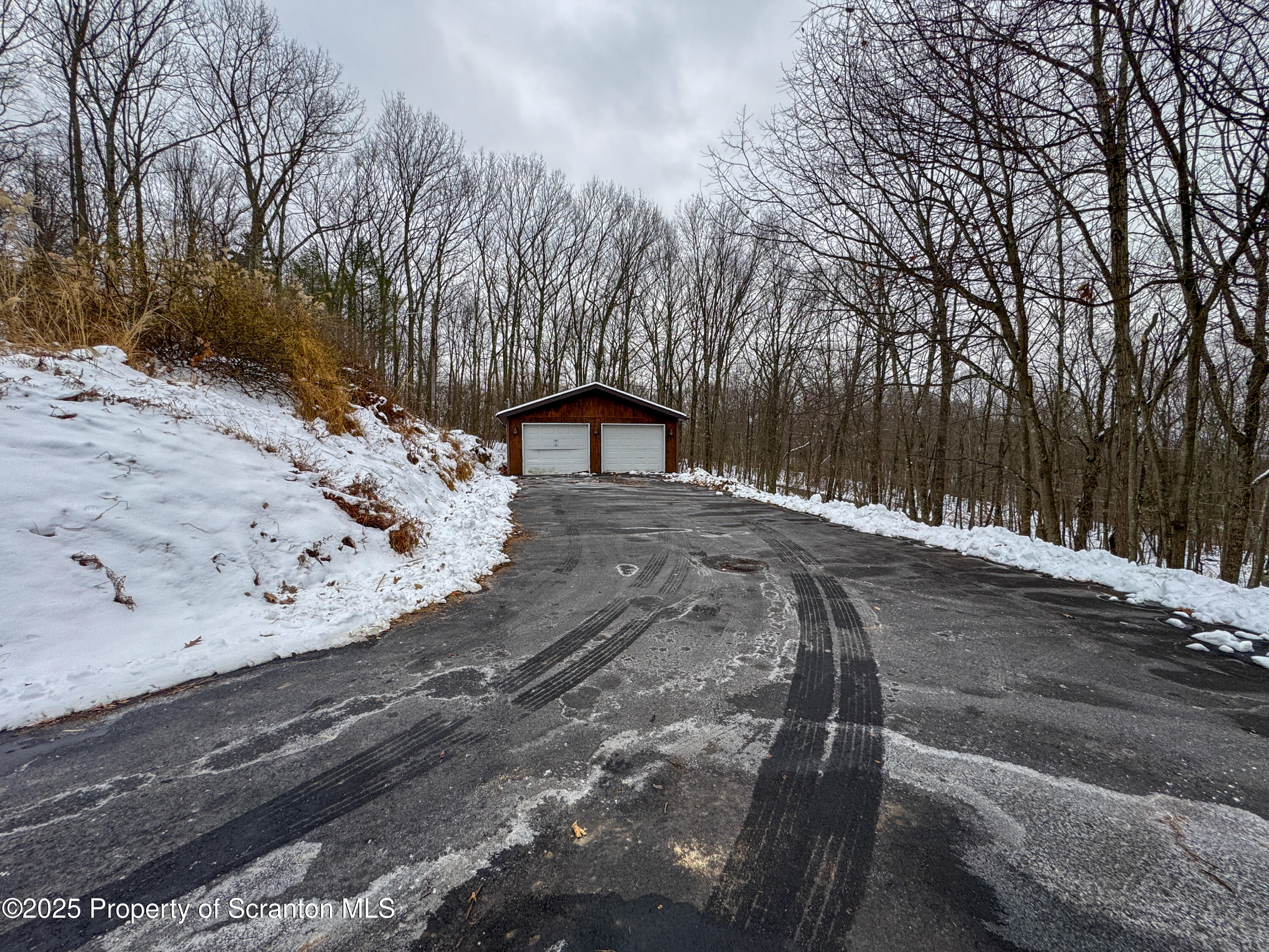 2607 Ransom Road Clarks Summit, PA 18411 - Photo 4 of 46 a view of a wooden fence