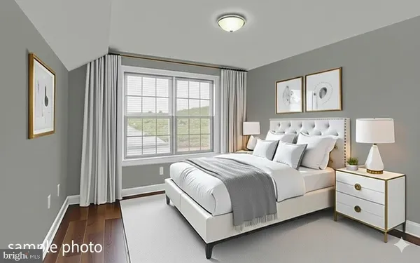 a bed room with a bed and a window