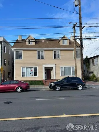 a car parked in front of a house