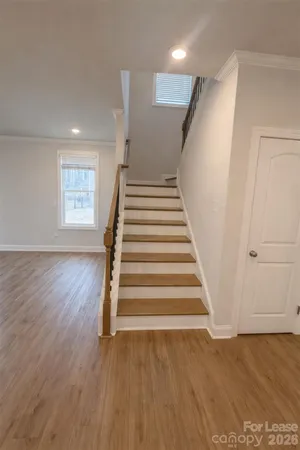 a view of entryway with wooden floor