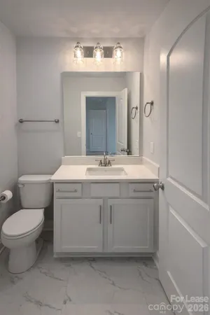 a bathroom with a shower and a toilet