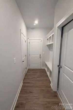 a view of a room with racks on the wall
