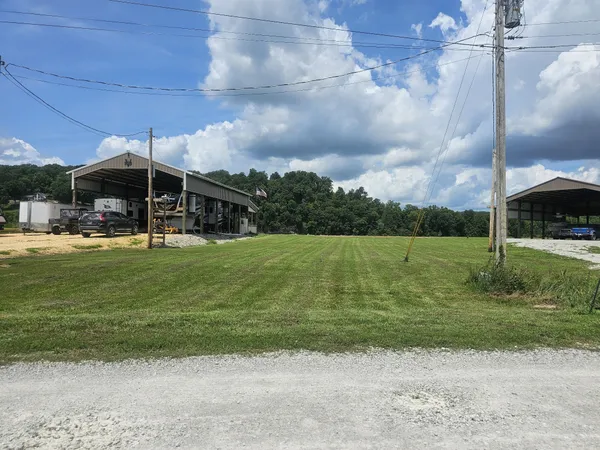 a view of a house with a big yard