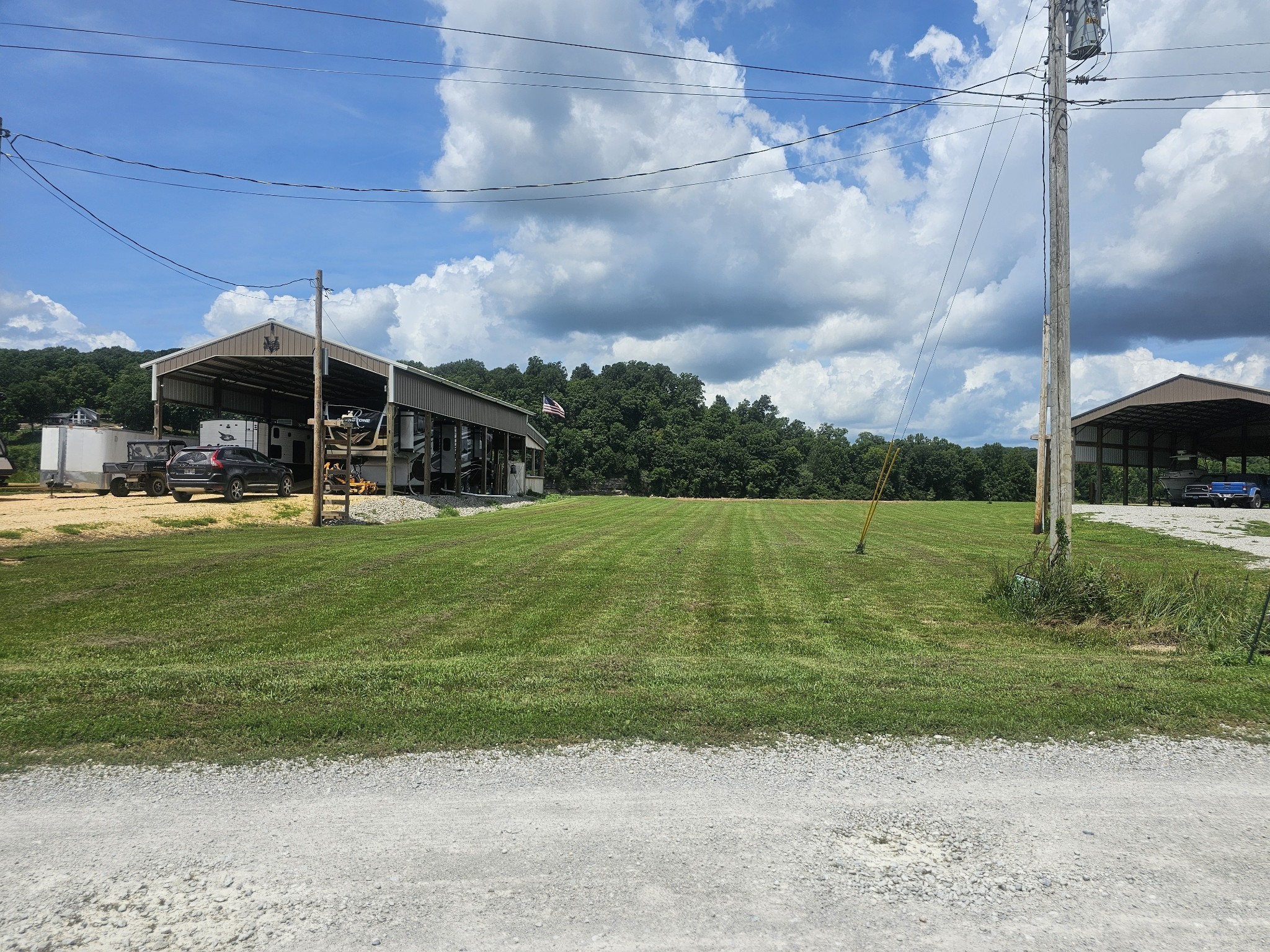 2271 Hardin Bottom River Road Clifton, TN 38425 - Photo 6 of 21 a view of a house with a big yard