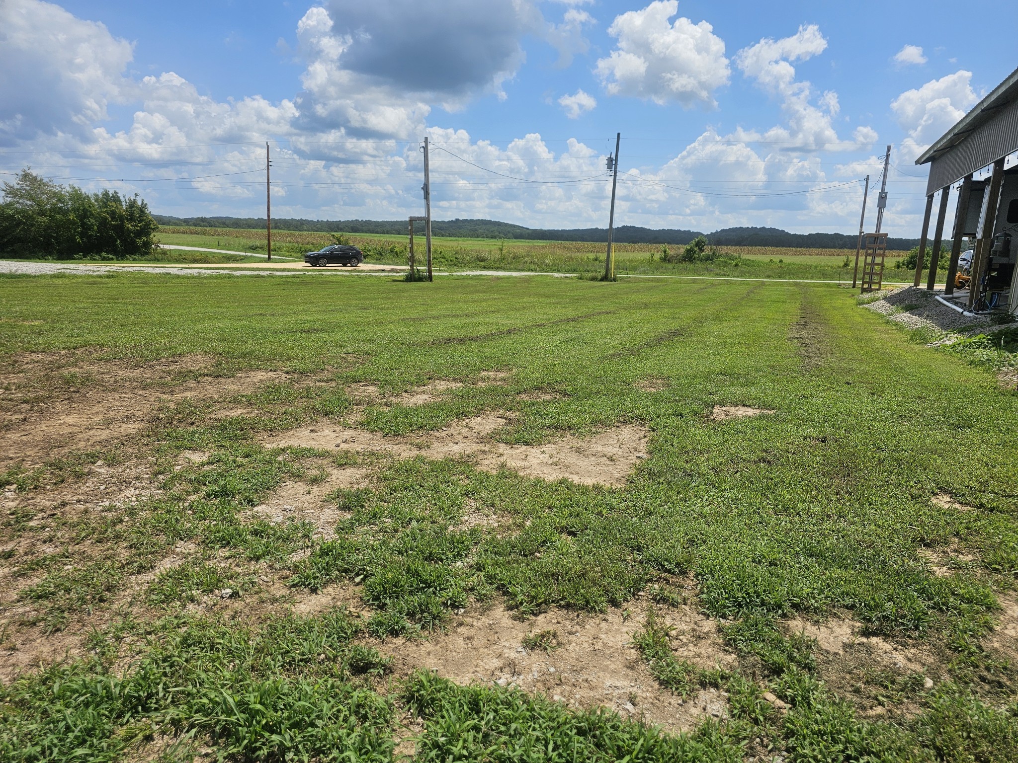 2271 Hardin Bottom River Road Clifton, TN 38425 - Photo 8 of 21 a view of a golf course with a big yard